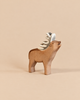 An Ostheimer Deer - Red Stag handcrafted wooden figurine with large, stylized antlers, perfect for imaginative play.