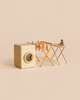 Maileg Laundry Room Set featuring a miniature washing machine, wooden drying rack with clothespins, and an ironing board with a small iron.