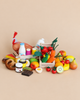 An Erzi Big Box of Play Food Shop Assortment containing beechwood fruits, vegetables, dairy, bread, and a chocolate bar, arranged in and around two small wooden crates for pretend play.