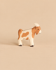 Holztiger Billy-Goat handcrafted wooden toy with brown and white markings.