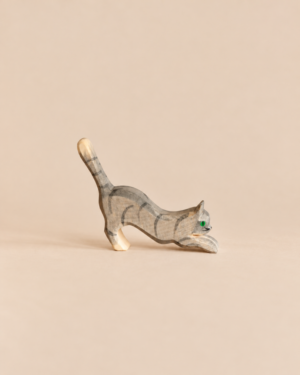Ostheimer Cat - Gray, Jumping, a handcrafted wooden toy cat in a gray striped coat, captured in a jumping or pouncing pose.