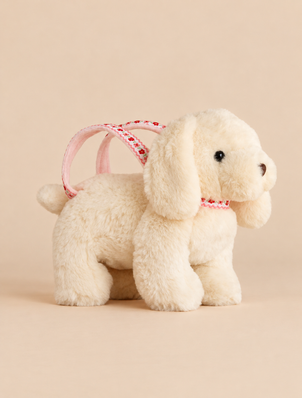 Off-white fluffy Konges Sloejd Puppy Bag - Off White with floral ribbon handles and a matching collar.