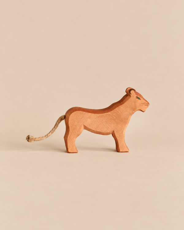 Ostheimer Female Lion handcrafted wooden toy featuring a rope tail.