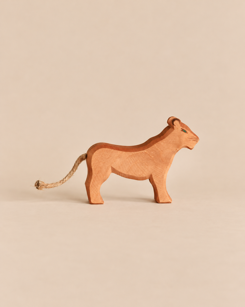 Ostheimer Female Lion handcrafted wooden toy featuring a rope tail.