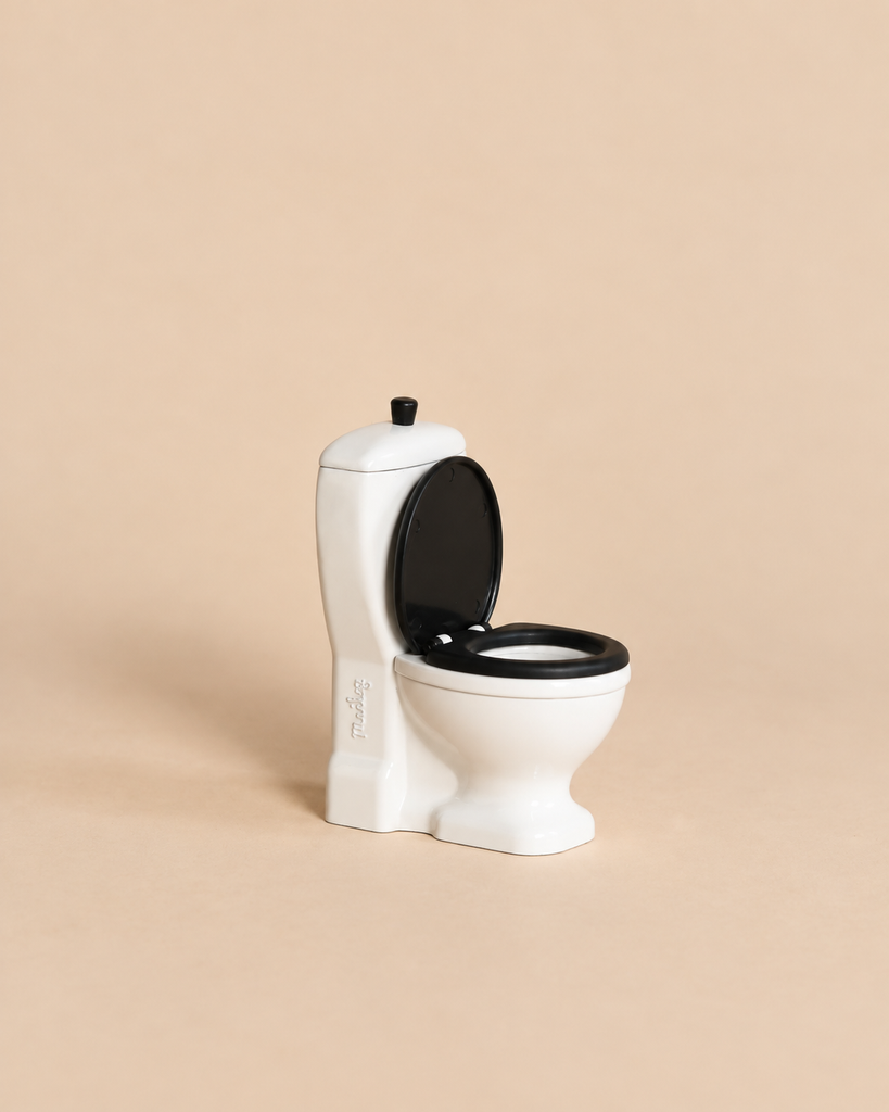 Maileg Toilet - Mouse Size, a small white toy toilet featuring a black seat and lid, designed as a miniature bathroom accessory.
