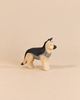 Hand-carved Ostheimer Dog - German Shepherd wooden figure with a black and tan painted finish, perfect for imaginative play.