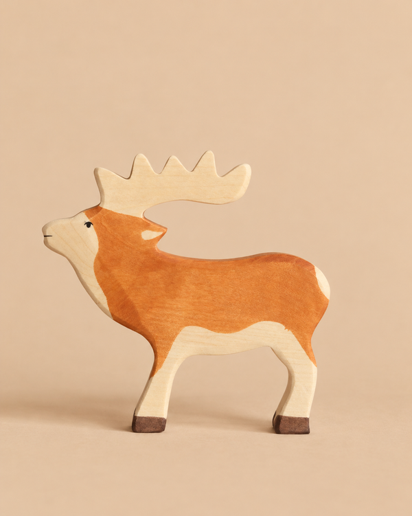 Hand-painted Holztiger Stag wooden toy with light brown and cream coloring, perfect for open-ended play.