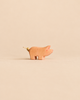 Small handcrafted wooden Ostheimer Piglet figurine with a knotted string tail, perfect for imaginative play.