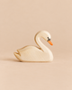 Ostheimer Swan handcrafted wooden toy with a painted orange beak and black eye detail.