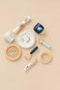 A Cutlery & Dinner Set for pretend play featuring plates, cups, a napkin in a ring, a spoon, a fork, and a knife, all decorated with botanical and bunny motifs.