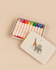 Konges Sloejd Beeswax Crayons - Safari: ten multicolored, non-toxic beeswax crayons inside a metal tin with a lid featuring illustrations of a giraffe, rhino, and elephant.