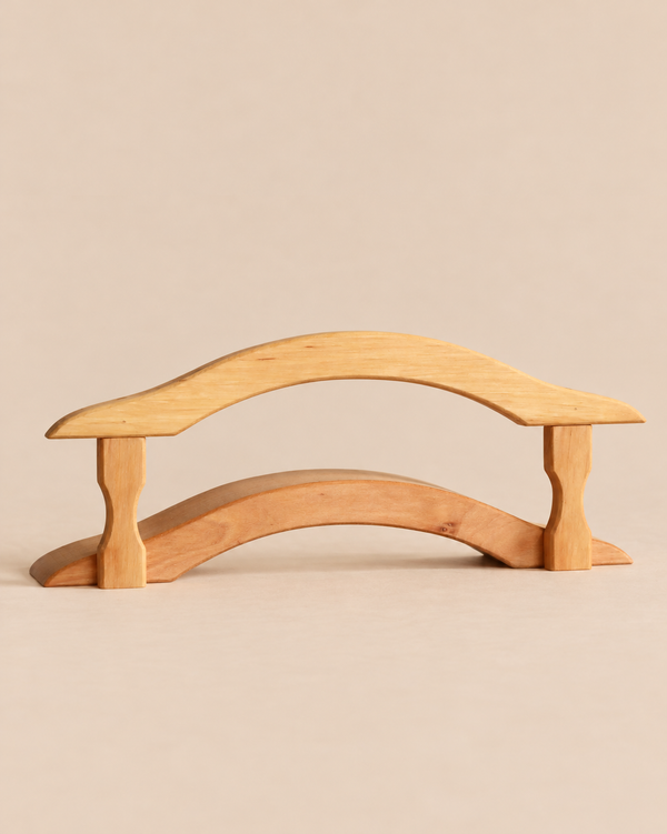 Ostheimer Bridge with Railing, a handcrafted wooden toy bridge with an arched top rail supported by two upright posts, perfect for imaginative play.