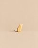 A small, sustainable Handmade Holzwald Mouse - Standing carved in a standing pose with a simple string tail.