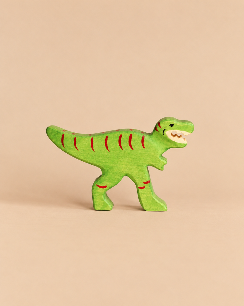 Handcrafted green Holztiger Tyrannosaurus Rex dinosaur toy with red stripe markings.