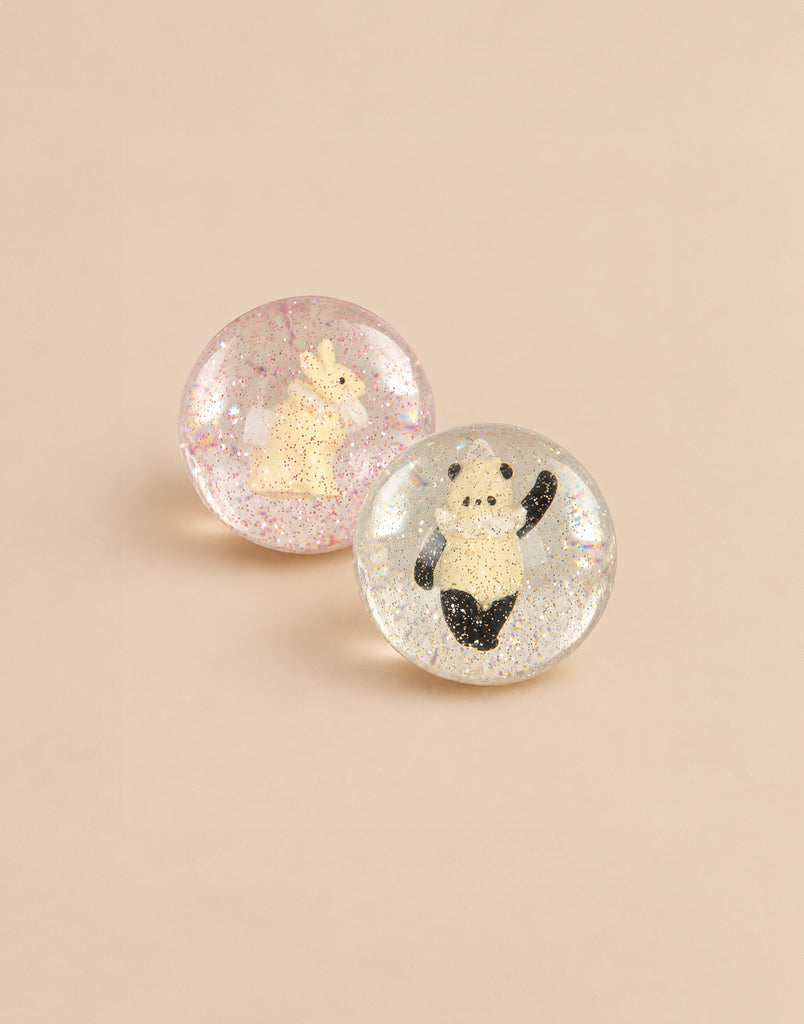 Konges Sloejd Glitter Bouncing Ball Set - Bunny & Panda featuring two clear glitter-filled bouncing balls, one containing a small bunny figure and the other a panda figure.