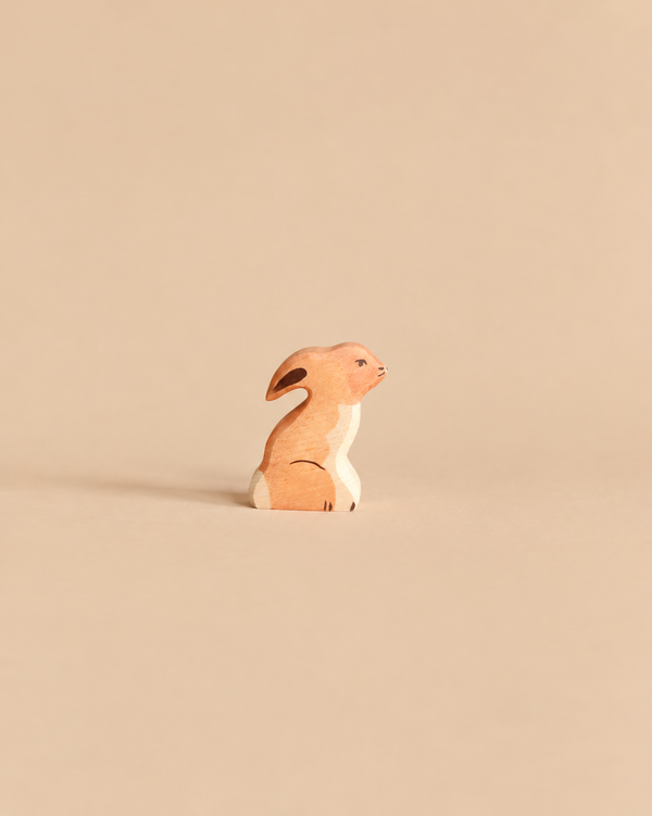 Handcrafted wooden Holztiger Rabbit, Sitting figure of a sitting rabbit.