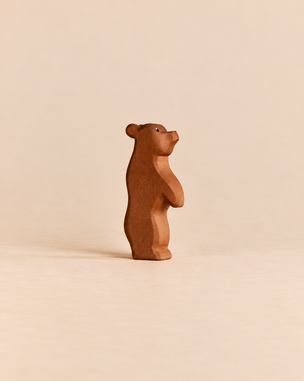 Small, handcrafted Ostheimer Small Bear - Standing made of wood and posing on its hind legs, perfect for imaginative play.