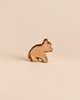 Ostheimer Small Bear - Sitting, a handcrafted wooden toy bear in a sitting position, perfect for imaginative play.