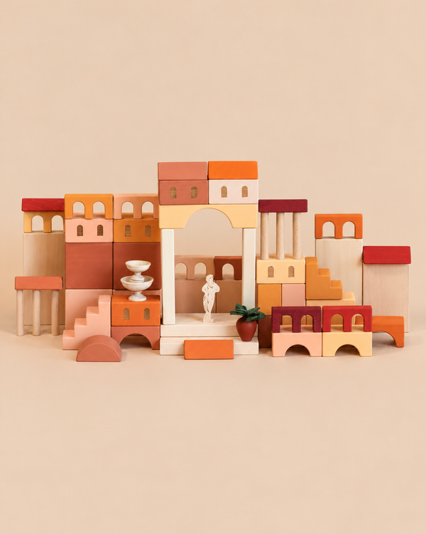 Sabo Concept Italian Courtyard Blocks arranged as a courtyard, featuring terracotta, red, and natural wood arches, pillars, a small statue, a fountain, and stairs.