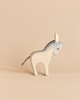 An Ostheimer Donkey - Standing, a handcrafted wooden toy shown in profile with a grey mane and a short cord tail, perfect for imaginative play.