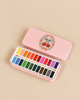 Konges Sloejd Water Colors Paint Set - Cherry Bow in a rectangular metal tin featuring a cherry and floral wreath illustration, containing two rows of colorful paint pans and a brush.