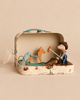 An open Maileg On The Go Cowboy Suitcase Set reveals a cowboy mouse holding a sausage skewer, a wooden rocking horse, a small bucket, and a fishing net.