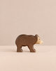 Handmade Holzwald Small Bear - Walking, a small wooden toy bear in a walking pose with a dark brown body and a light tan face, crafted as a sustainable toy.
