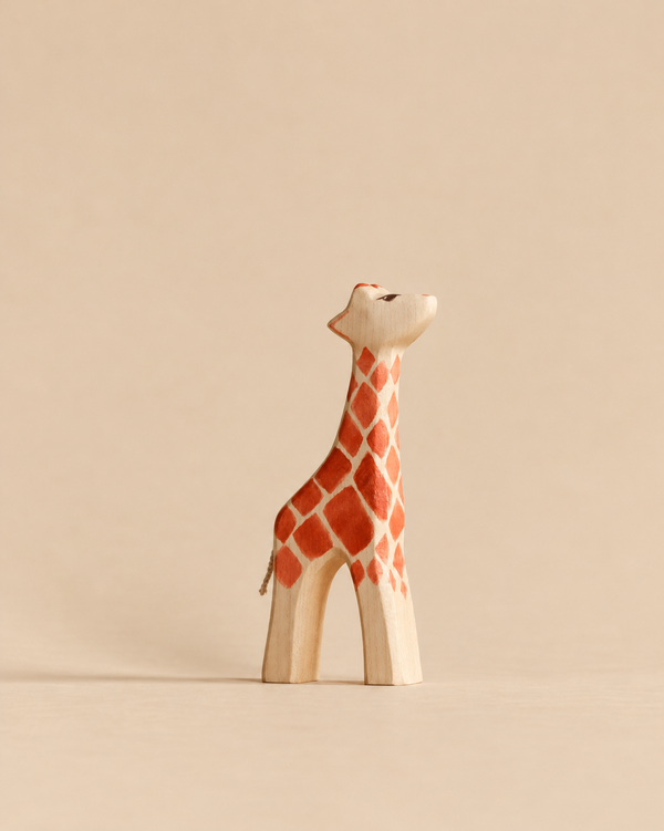 Handmade Holzwald Giraffe - Small wooden toy with hand-painted orange patches.