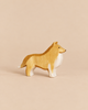 Ostheimer Dog - Collie Dog, a handcrafted wooden figurine of a standing dog with a tan and white coat, made from sustainably sourced materials.