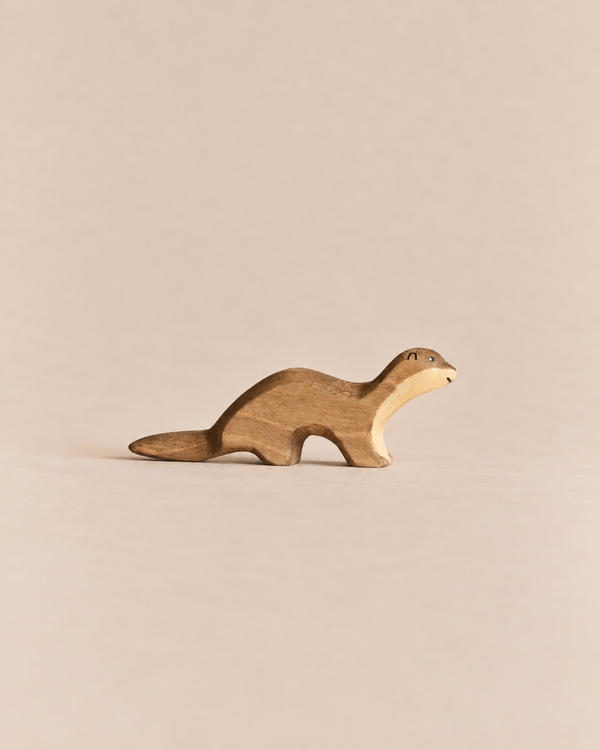Handmade Holzwald otter wooden figurine.