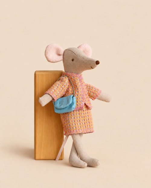 Maileg Mom Mouse With Extra Outfit - Petite Couture featuring a beige fabric mum mouse wearing a pink and orange tweed skirt suit and a small blue crossbody bag.