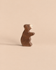 Holztiger Little Brown Bear, a handcrafted wooden figurine standing on its hind legs.