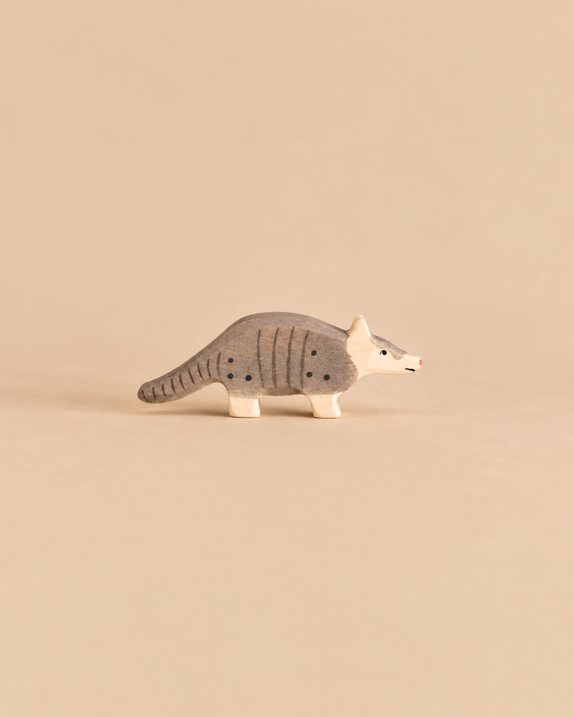 Holztiger Armadillo handcrafted wooden toy with grey markings and dark spots.