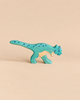 Handcrafted Holztiger Pachycephalosaurus Dinosaur painted turquoise with dark blue spots.
