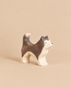 Hand-carved Ostheimer Sled Dog, Standing, featuring a standing husky with grey and white markings, designed for imaginative play.