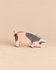 Ostheimer Spotted Pig - Head Low hand-carved wooden figurine with pink and grey spots and a rope tail.