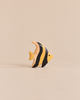 A small, wooden Handmade Holzwald Moorish Idol Fish toy featuring yellow and black vertical stripes.