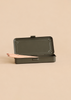 Open olive green Toyo - Steel Stackable Storage Box T-192 containing two wooden pencils.
