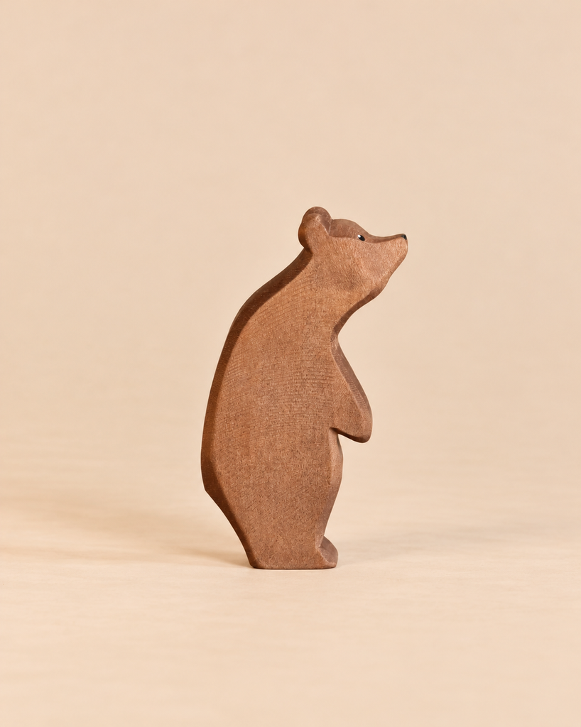 Ostheimer Large Bear - Standing Head High handcrafted wooden toy figure of a standing bear with its head tilted upward, designed for imaginative play.