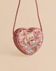 Konges Sloejd Tut Kitty Shoulder Bag, a pink heart-shaped glitter bag featuring an embroidered kitten sitting inside a cocktail glass.