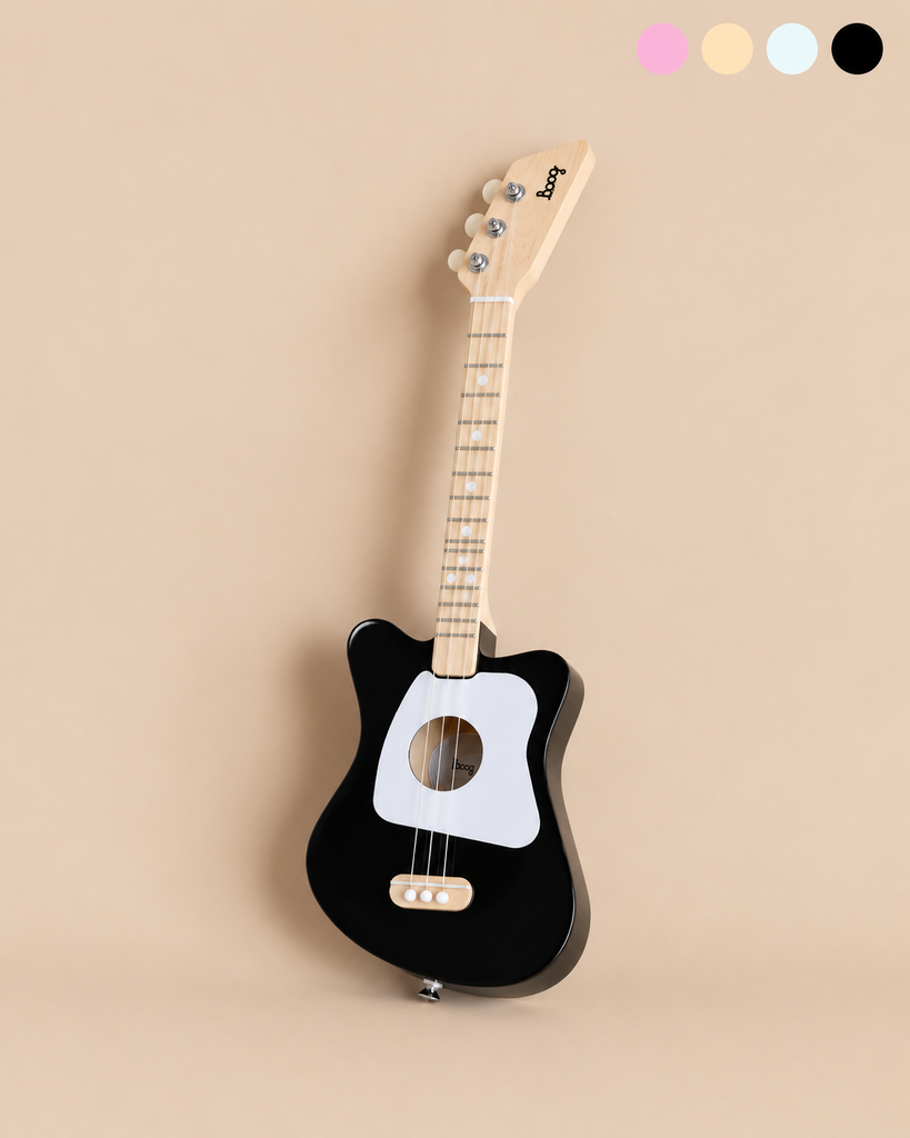 Black wooden Kids Wooden Guitar - Ages 3+ 3-string Loog Mini with a white pickguard and four tuning pegs.