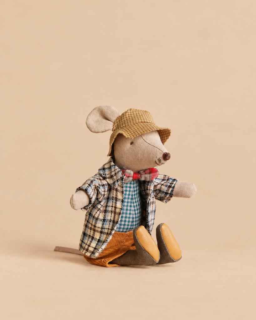 Maileg Granddad Mouse toy wearing a plaid jacket, bowtie, and hat, sitting with legs extended.