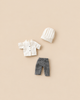 Maileg Extra Clothing: Chef Clothes For Big Sister And Big Brother Mouse, featuring a white jacket with black buttons, black and white checkered pants, and a white chef’s hat.