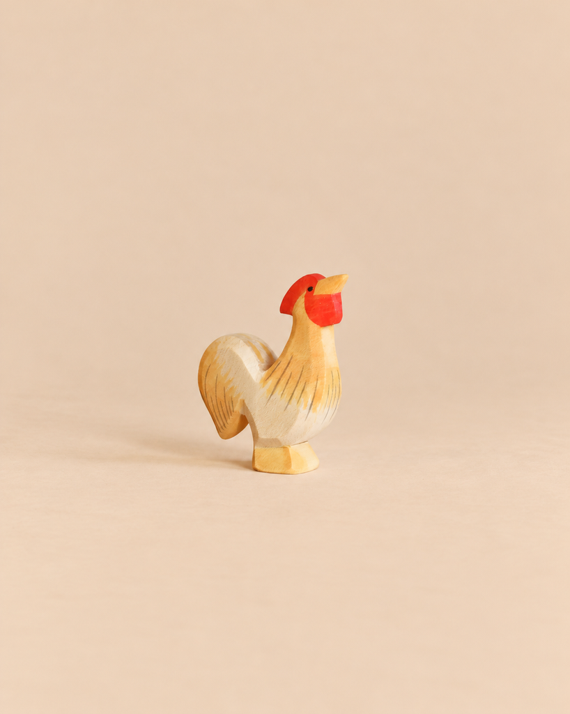 Handcrafted Ostheimer Rooster - Ochre wooden figurine with a red comb and wattle.