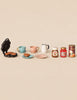 Maileg Garden Tea Set featuring a waffle iron with heart-shaped waffles, two cups and saucers, a pitcher, and jars of chocolate spread, jam, and hot chocolate, perfect for Maileg mice.