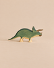 Handmade Holzwald Dinosaur Set triceratops toy with a green-stained body and natural wood-toned legs and horns.