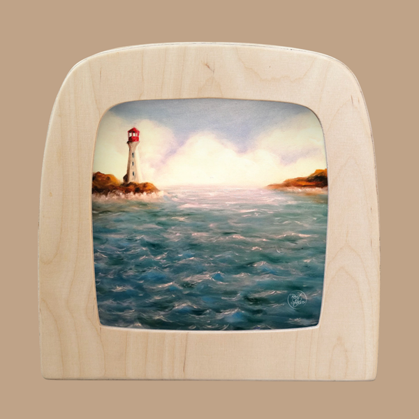 The Silhouette Only - Lighthouse for Toverlux Lamp features a striking lighthouse with a red top on a rocky shore, overlooking choppy blue sea beneath cloudy skies, captured in vibrant detail to enhance your lamp’s ambiance.