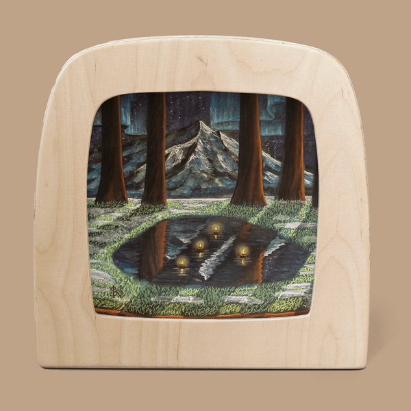 The Silhouette Only - February for Toverlux Lamp features a translucent nighttime forest scene with tall trees, pond reflections, grass, mountains, and a starry sky with northern lights—a captivating home accessory. Ships in one week.