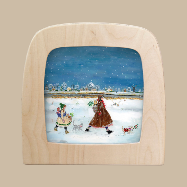 The "Silhouette Only - Winter Stroll for Toverlux Lamp" features two women with greenery and small dogs crossing snowy fields, a village behind them—all artfully crafted for enchanting winter decor by Magic Silhouettes.