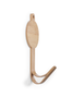 The Coat Hanger - Brown Hare is a wall-mounted bamboo hook with a circular backplate and single curved arm, designed for hanging items. Its minimalist and modern brown finish adds style to any space.